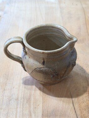Handcrafted Ceramic Pitcher With Textured Design Natural Glaze Finish 5 Inches T